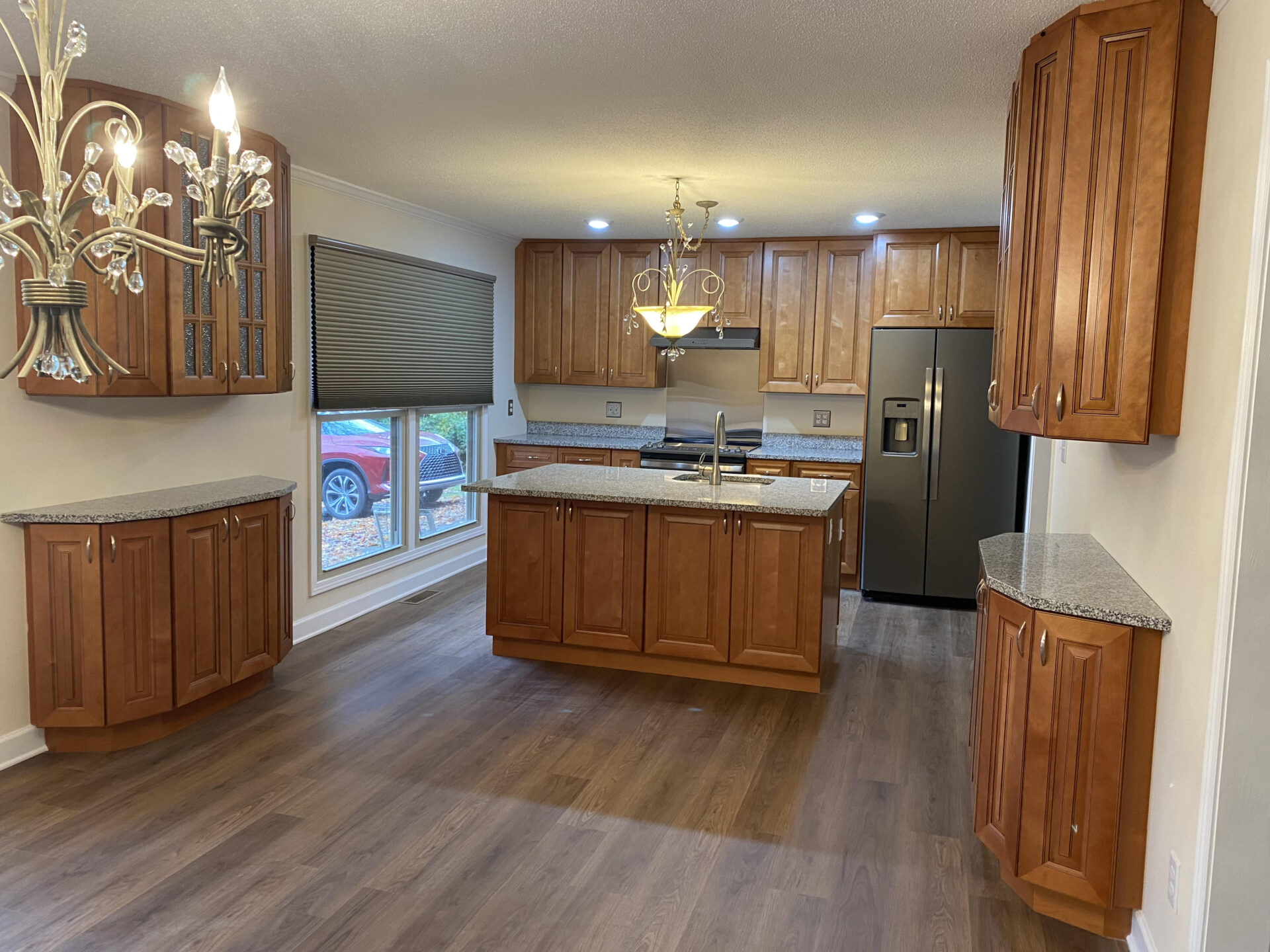 Oak Cabinet Kitchen with Vinyl Plank Flooring