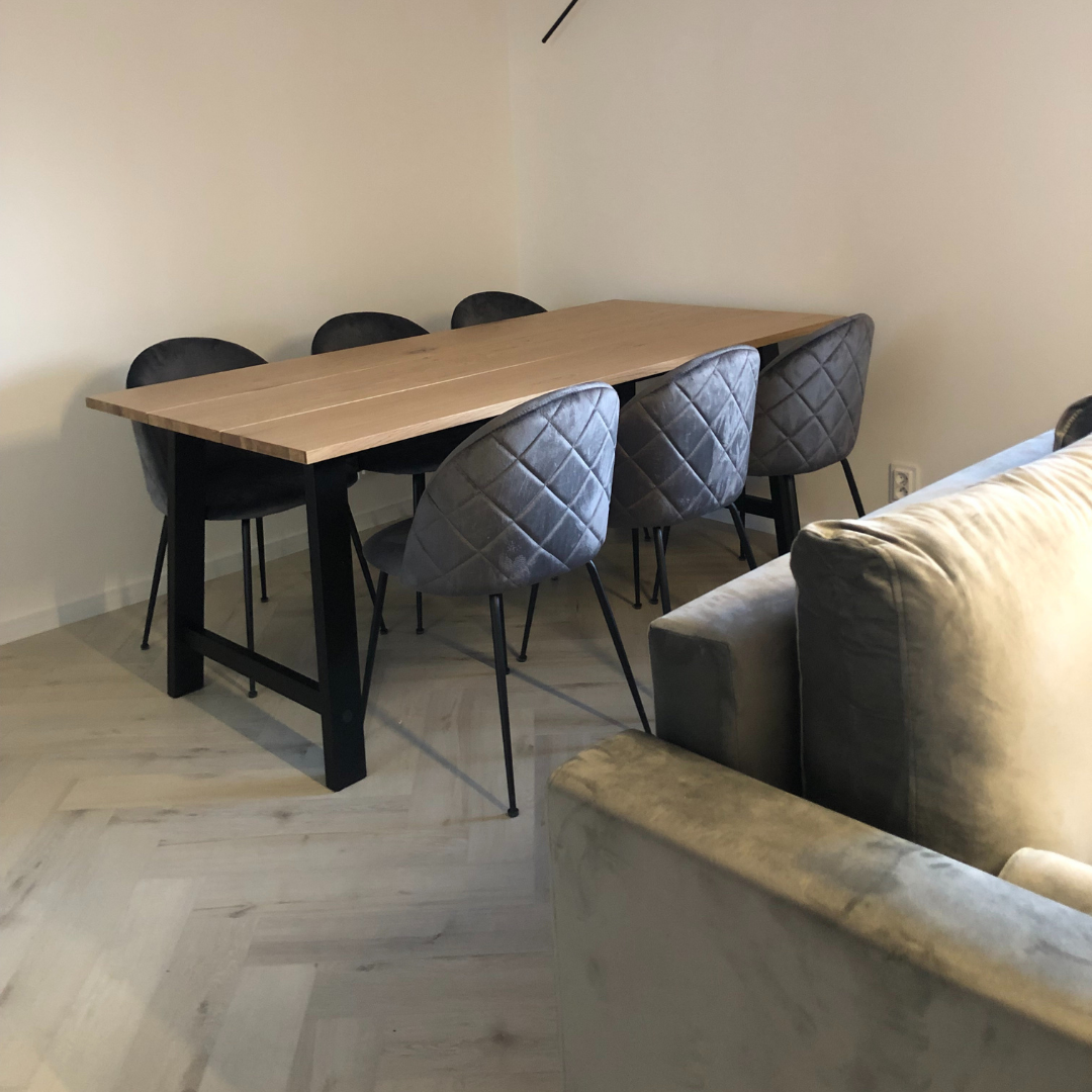 modern dining room with Bestlaminate Adduri Herringbone Cappucino Oak vinyl flooring